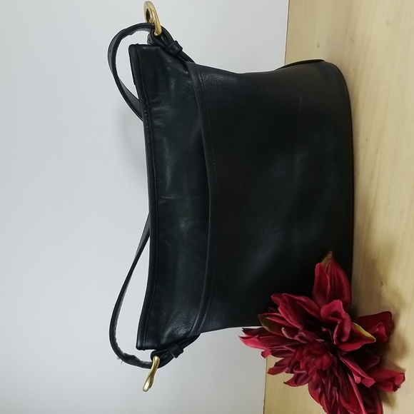 Coach Handbags - Vintage Coach Worth black leather crossbody bag